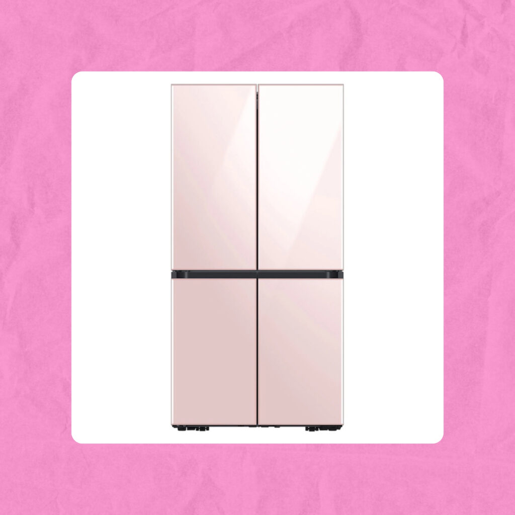 A sleek, modern four-door refrigerator in glossy pastel pink with a minimalist design.